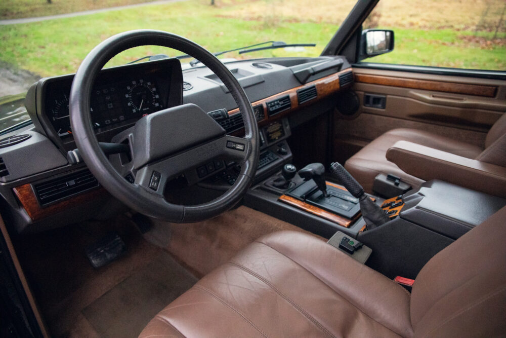 Vintage car interior with leather seats and dashboard