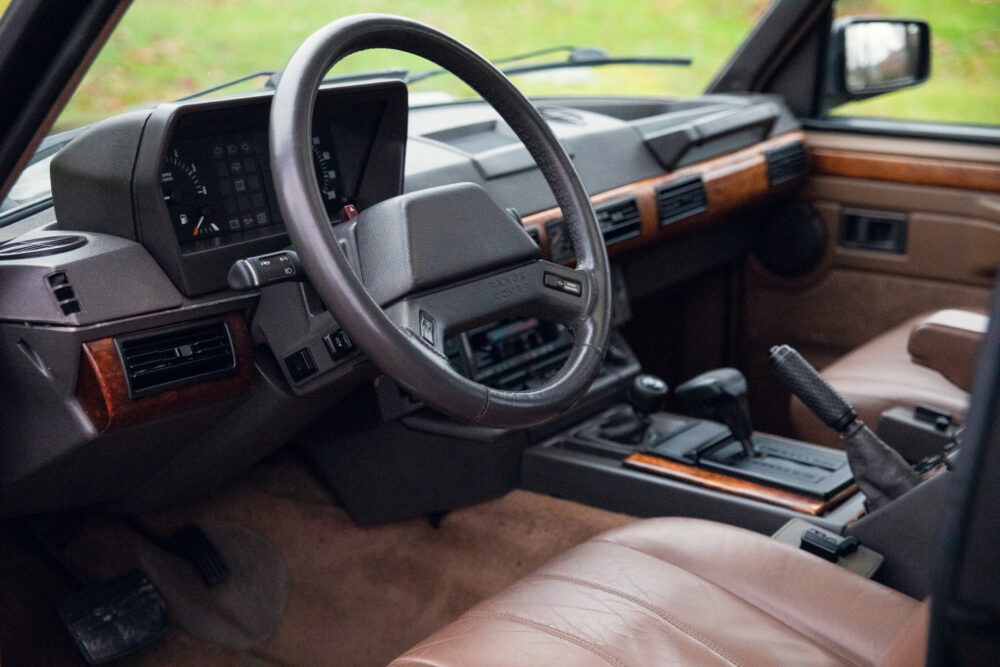 Vintage car interior with leather seats and dashboard