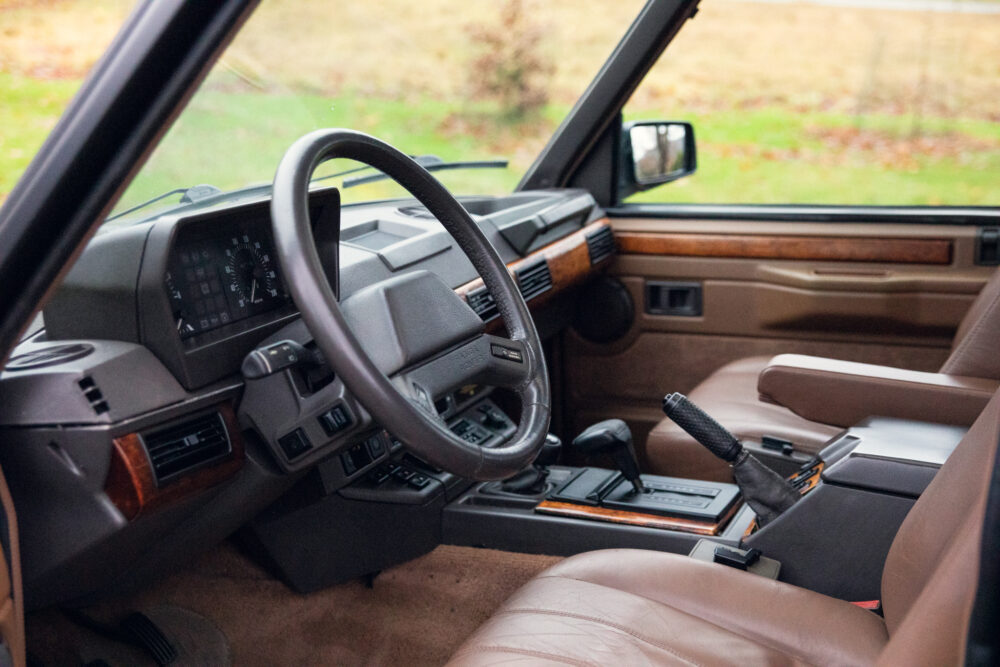 Vintage car interior with leather seats and dashboard