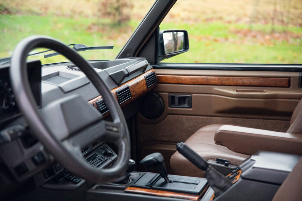 Vintage car interior with leather seats and dashboard