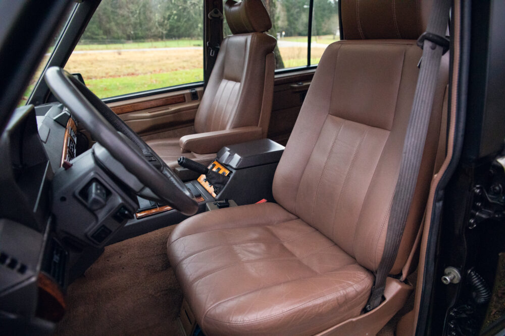 Vintage car interior with brown leather seats