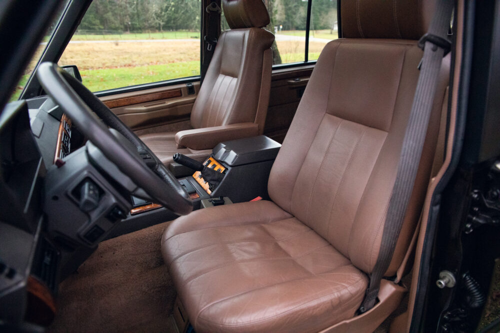 Vintage car interior with brown leather seats
