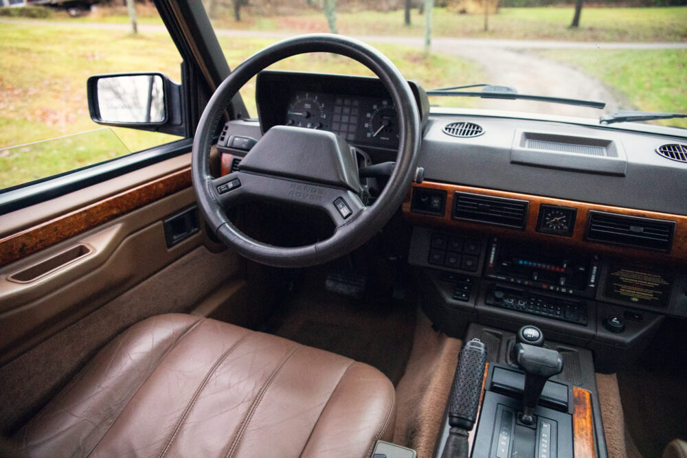 Vintage car interior with leather seats and dashboard