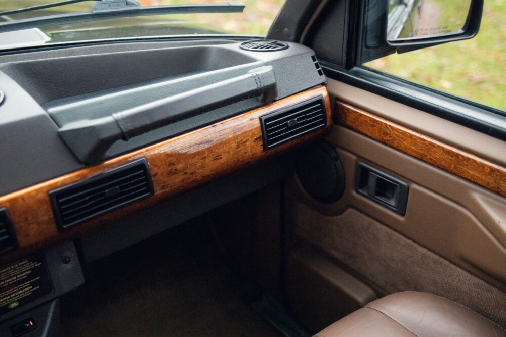 Vintage car interior with wooden dashboard