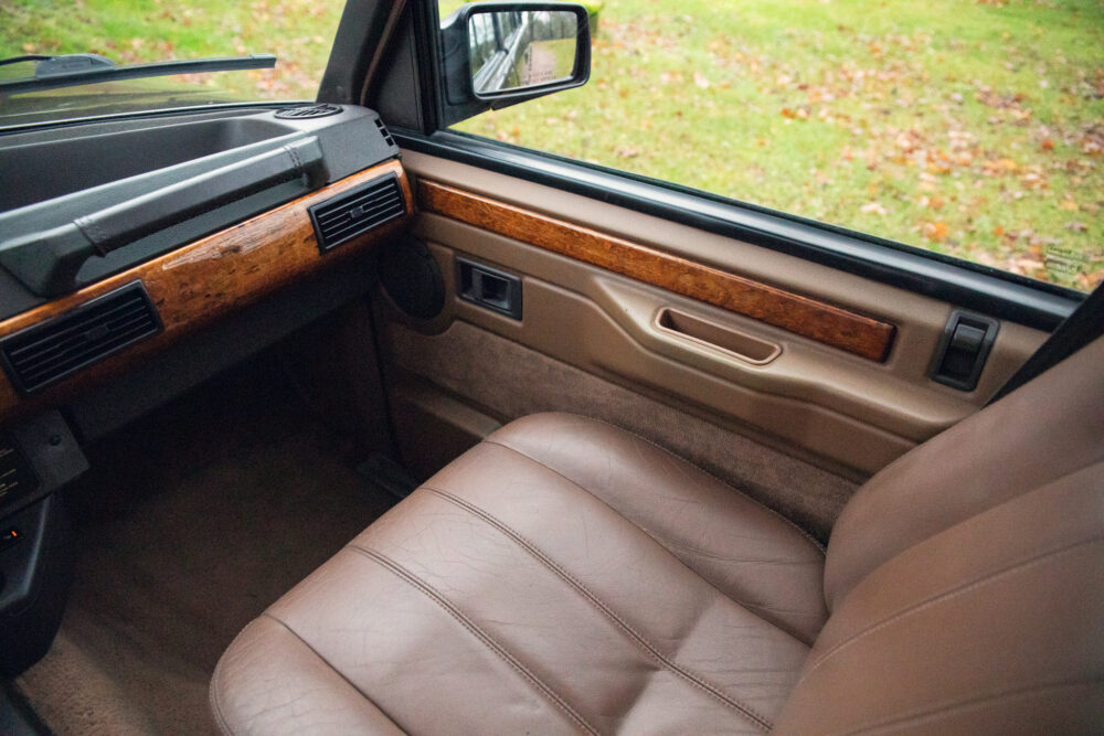 Classic car interior with leather seats and wood trim