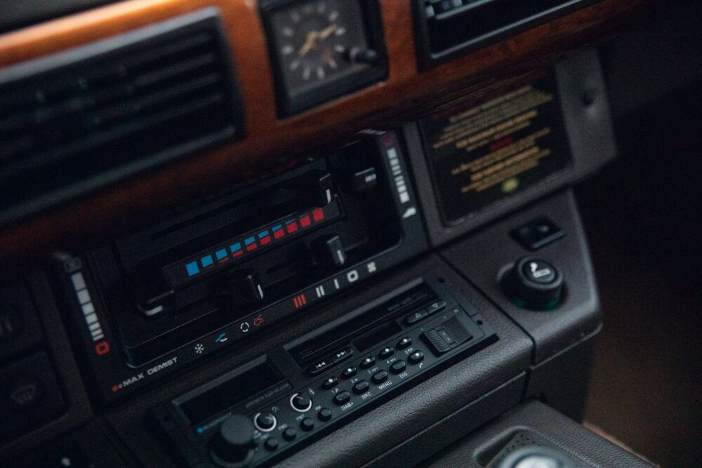 Vintage car dashboard with climate controls and radio