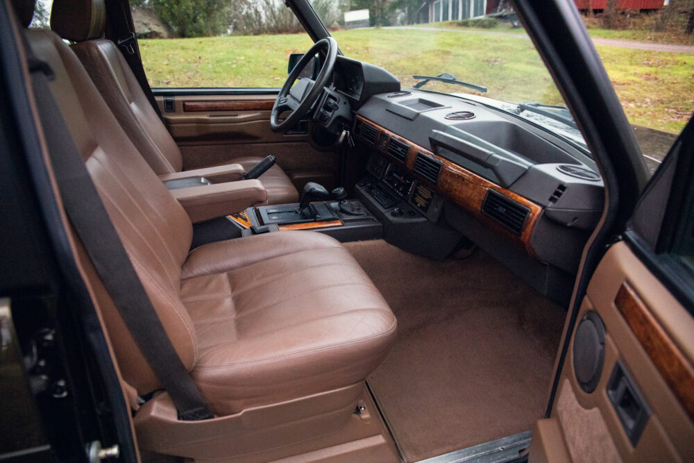Vintage car interior with leather seats and dashboard