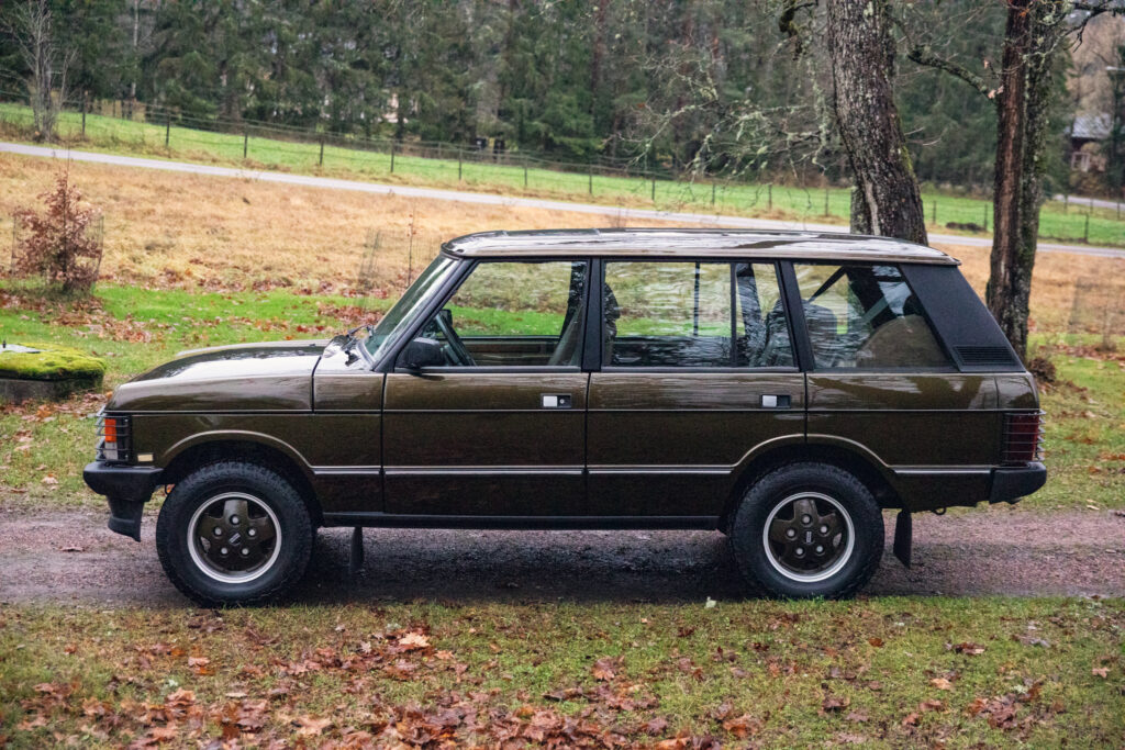Vintage brown SUV parked outdoors in rural setting