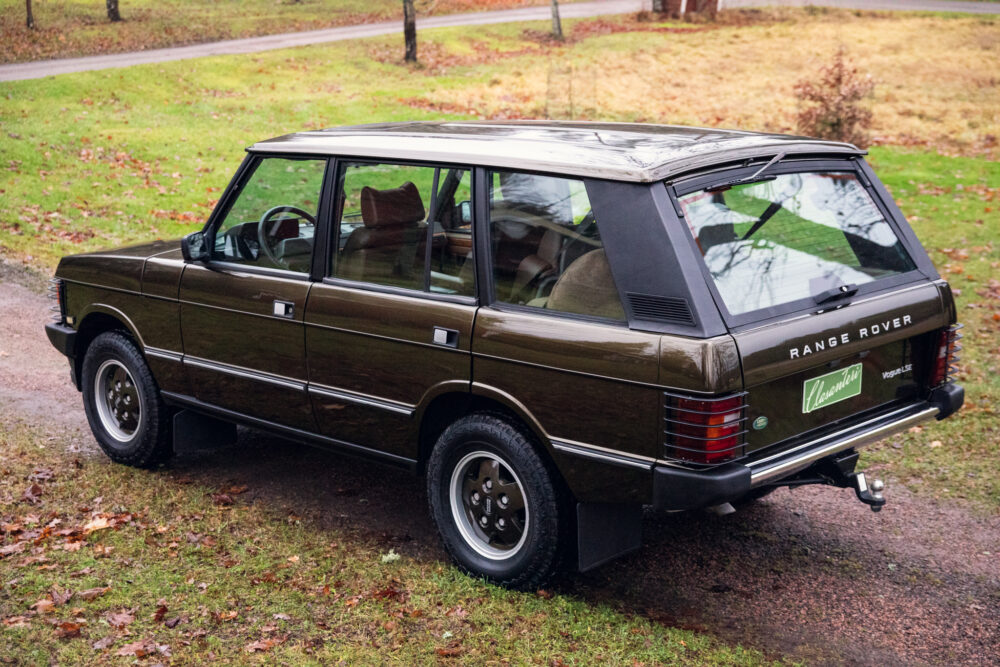 Vintage Range Rover parked on wet autumn day