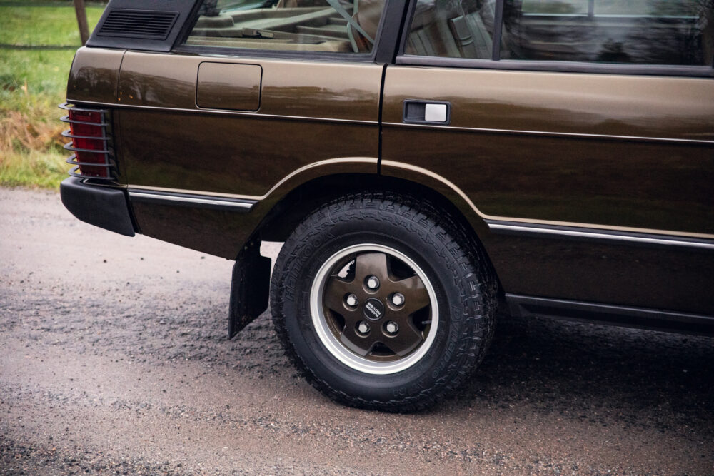 Vintage brown car close-up on rear wheel