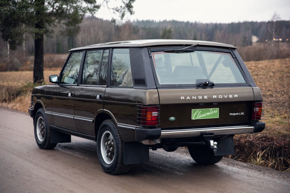 Vintage Range Rover Classic parked on country road