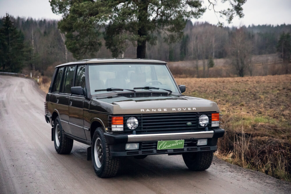 Vintage Range Rover on rural road