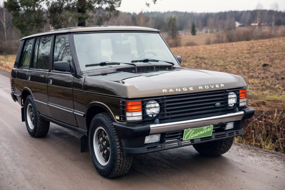 Vintage Range Rover on rural road