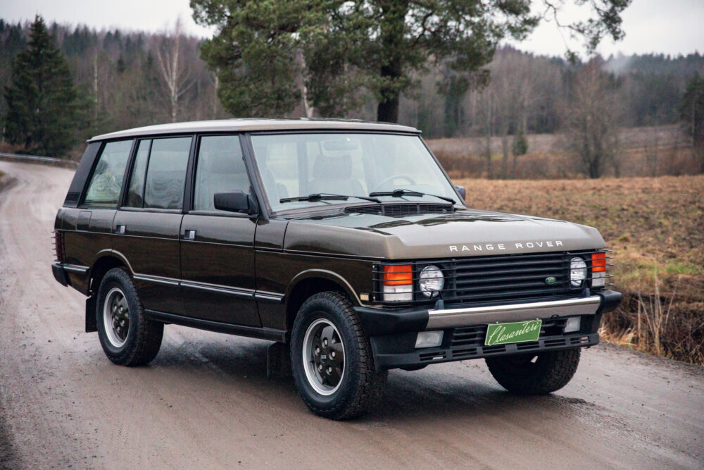 Vintage Range Rover on rural road