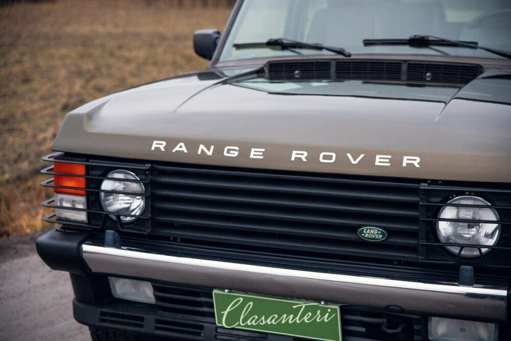 Close-up of classic Range Rover front grille and logo
