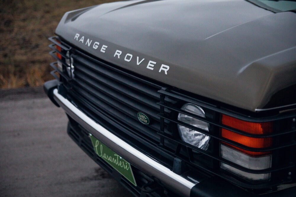 Close-up of Range Rover front grille and headlight