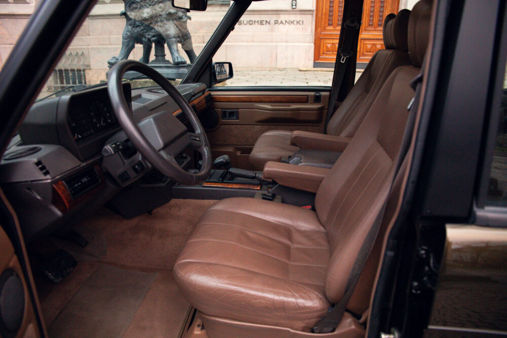 Vintage car interior with brown leather seats