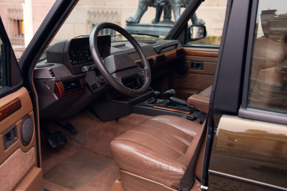 Vintage car interior with leather seats and dashboard