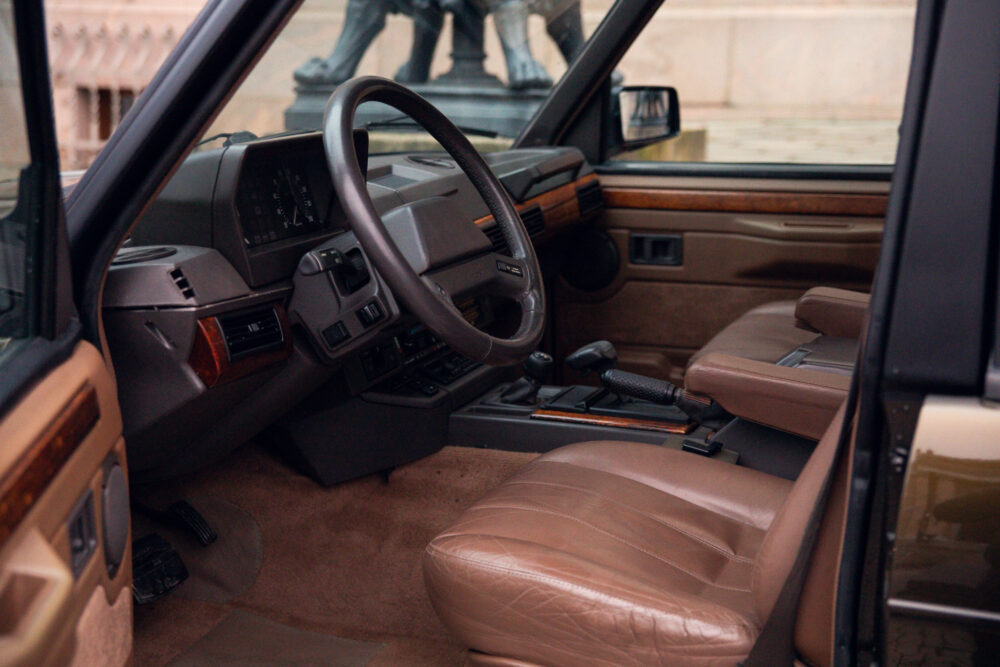 Vintage car interior with leather seats and dashboard