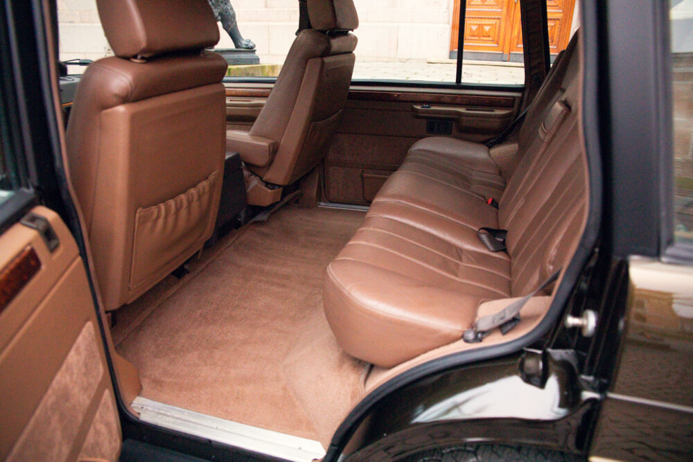 Luxury car interior with leather seats and spacious design