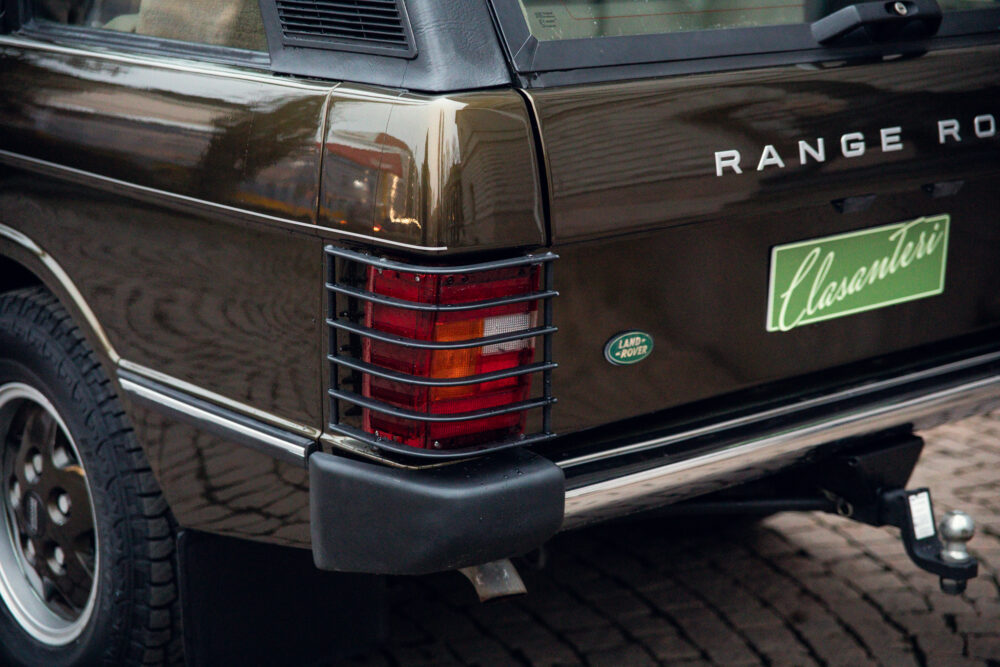 Vintage Range Rover taillight and logo close-up