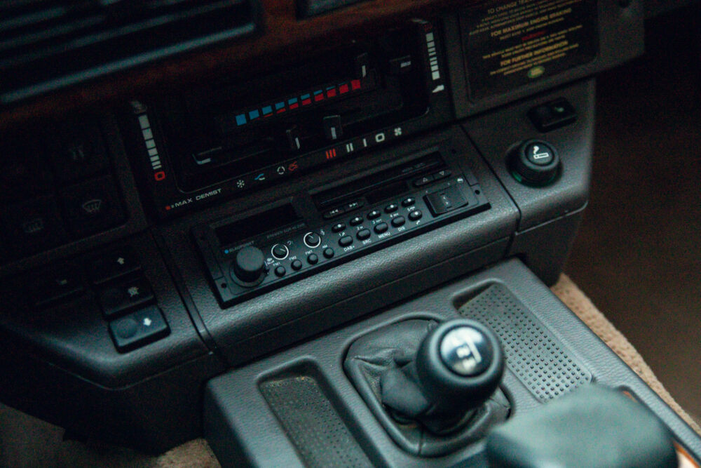 Vintage car dashboard with radio and gear shift