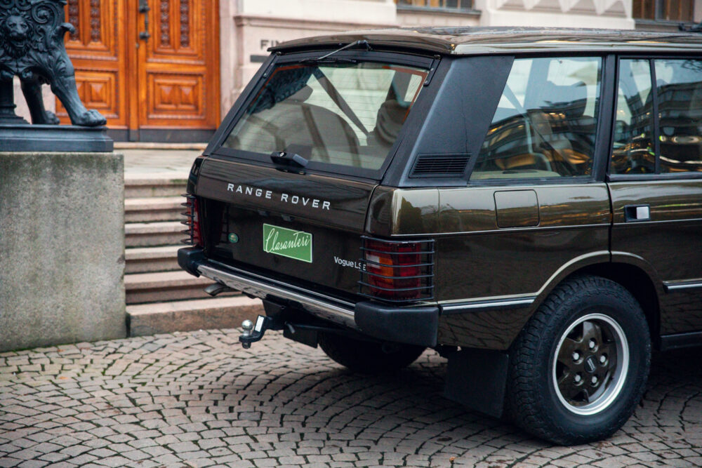 Vintage Range Rover near historic building