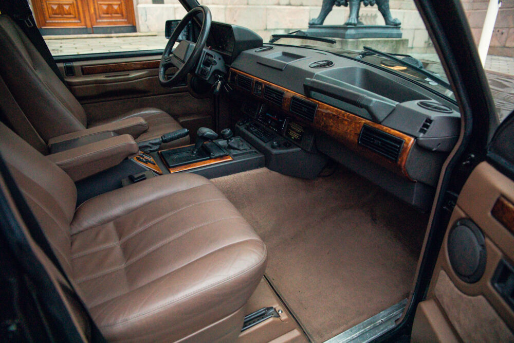 Vintage car interior with leather seats and dashboard