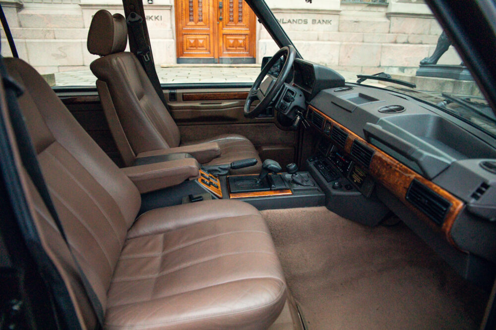 Vintage car interior with leather seats and dashboard