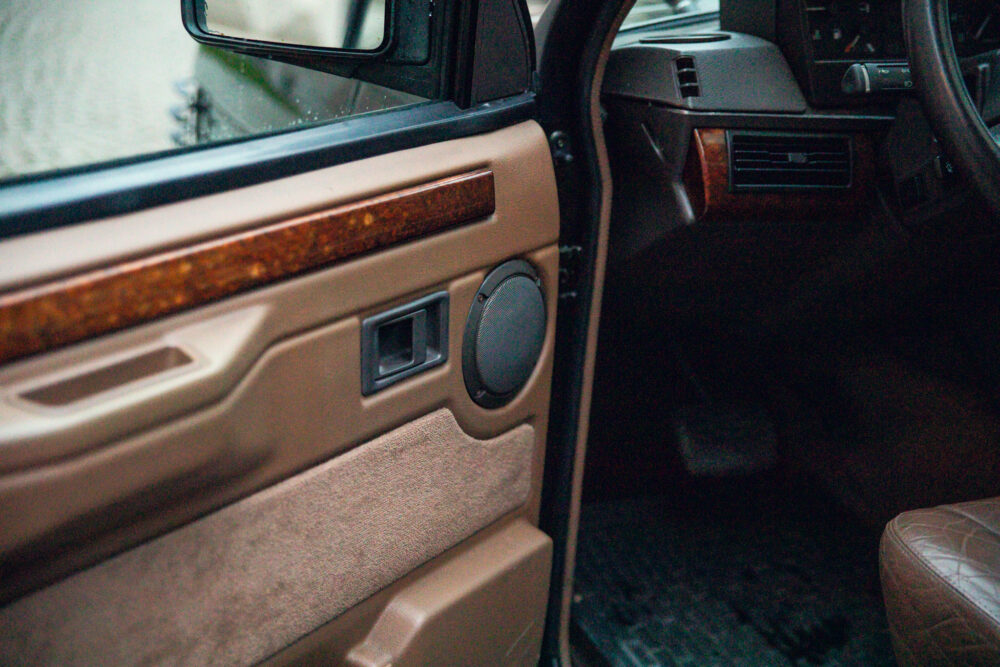 Vintage car door interior with wooden accents