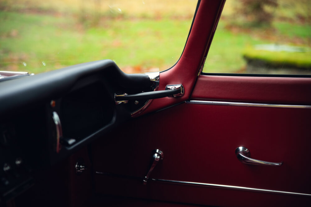 Vintage red car interior with chrome details
