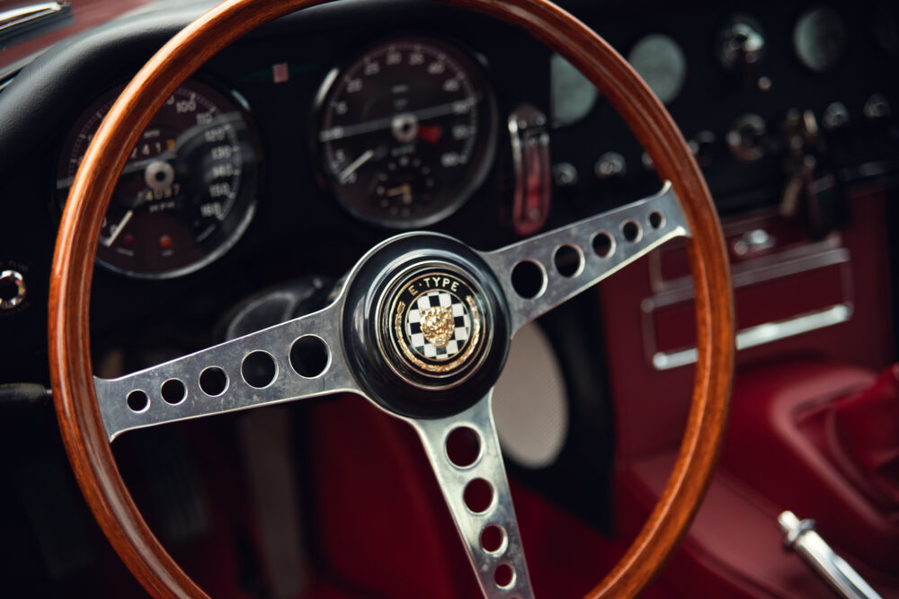 Vintage E-Type Jaguar steering wheel and dashboard