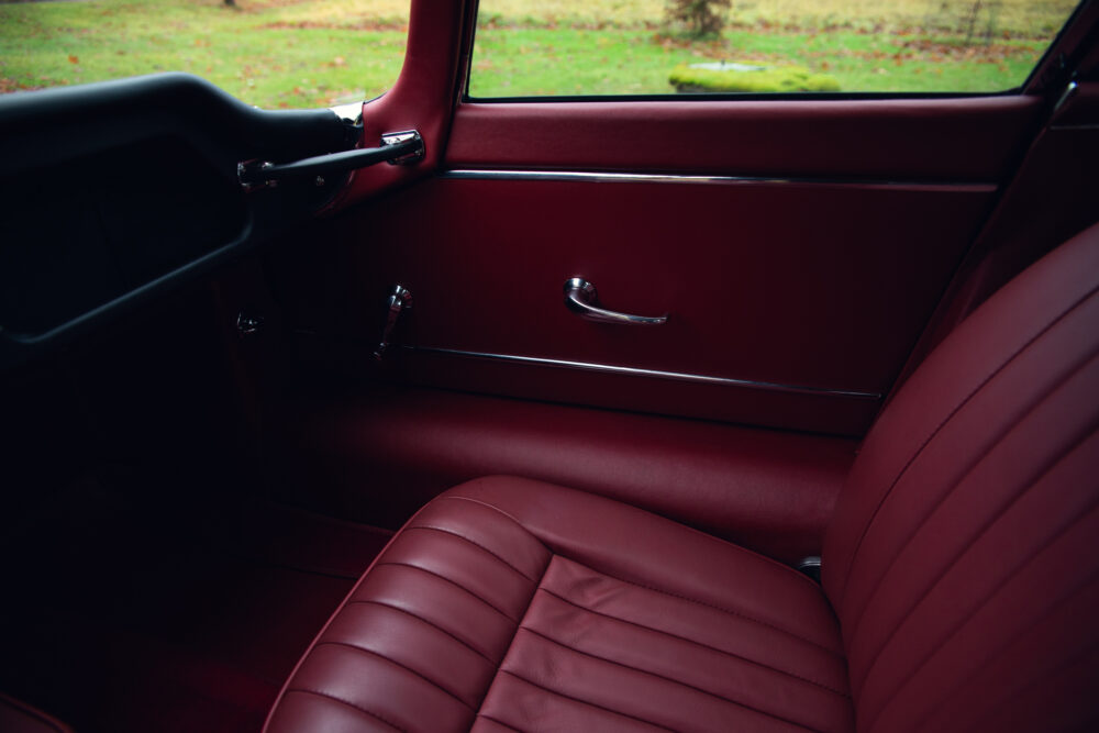 Red vintage car interior with leather seats