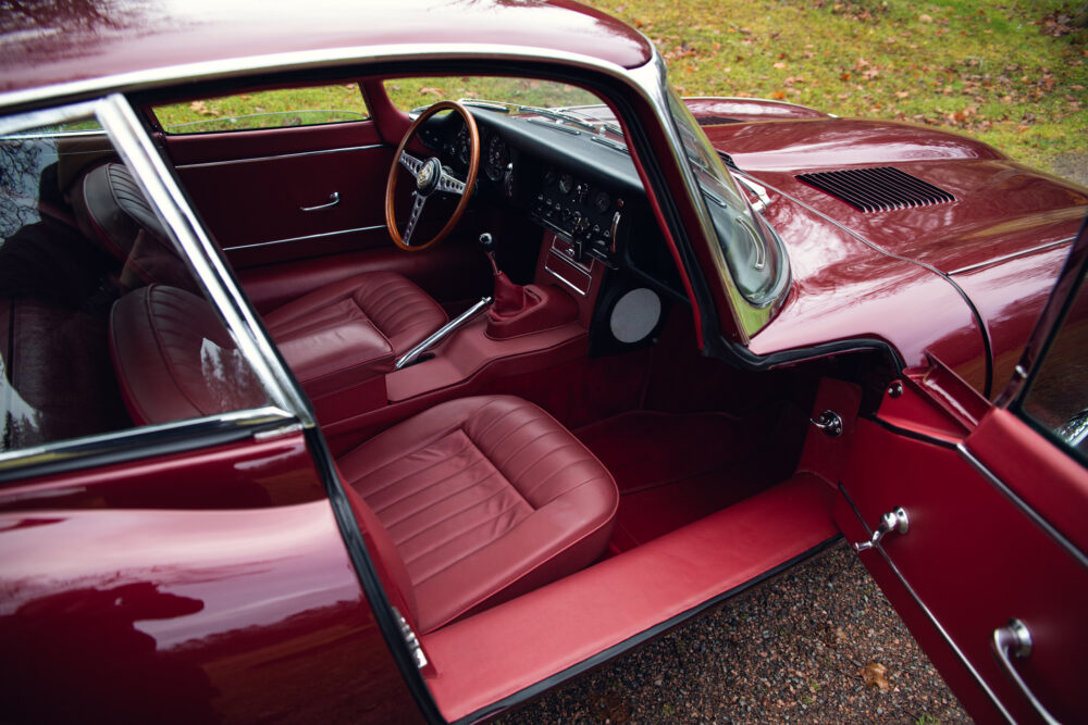 Vintage red car interior with classic leather seats