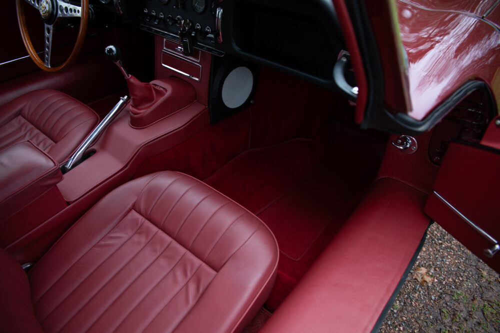 Elegant red vintage car interior with leather seats