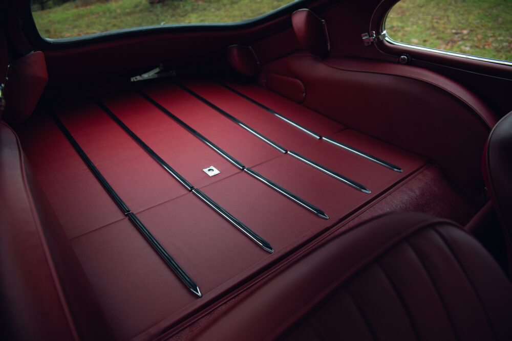 Red leather car interior with elegant design details