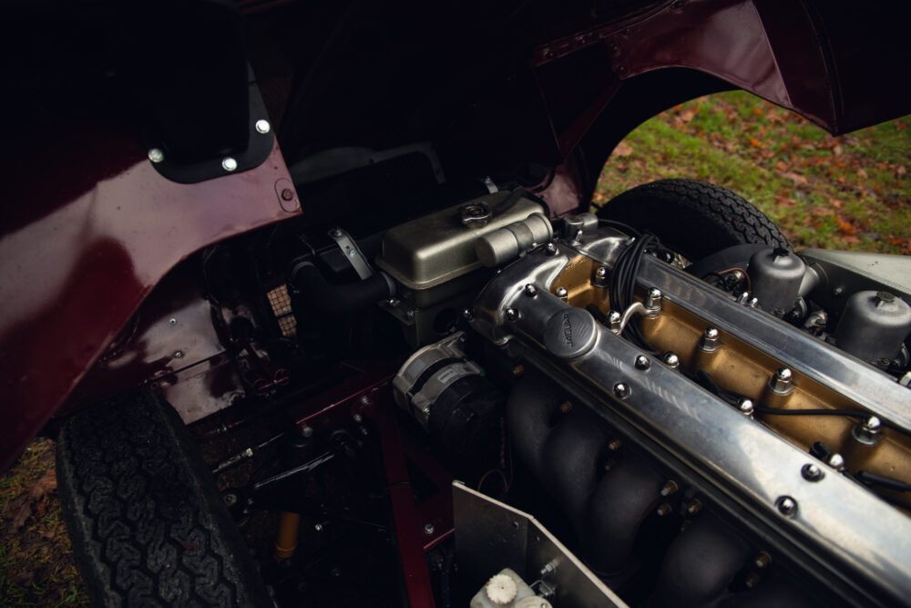 Vintage car engine close-up with metallic parts