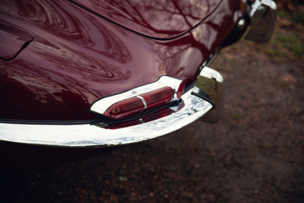 Close-up of red vintage car's tail light