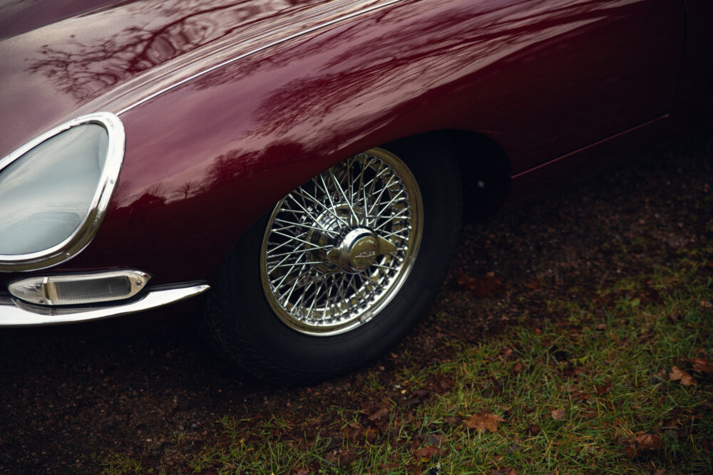 Close-up of vintage car wheel and front lights