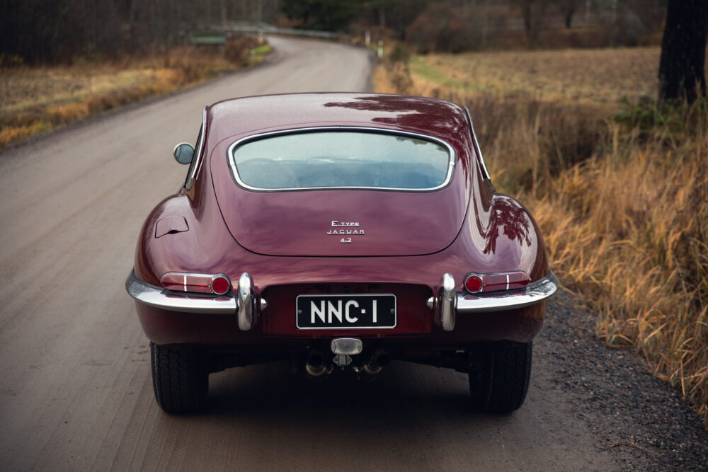 Vintage Jaguar E-Type car on rural road
