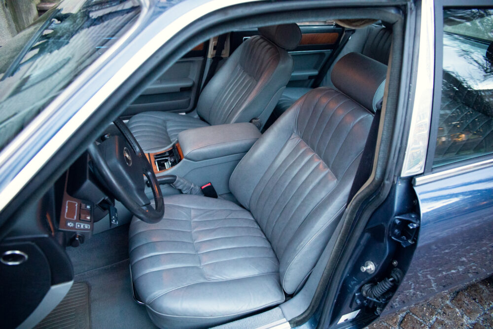 Interior view of luxury car front seats and dashboard