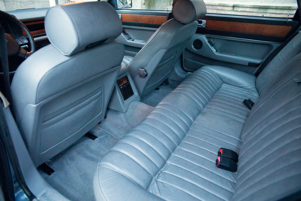 Luxury car interior with leather seats and wood accents
