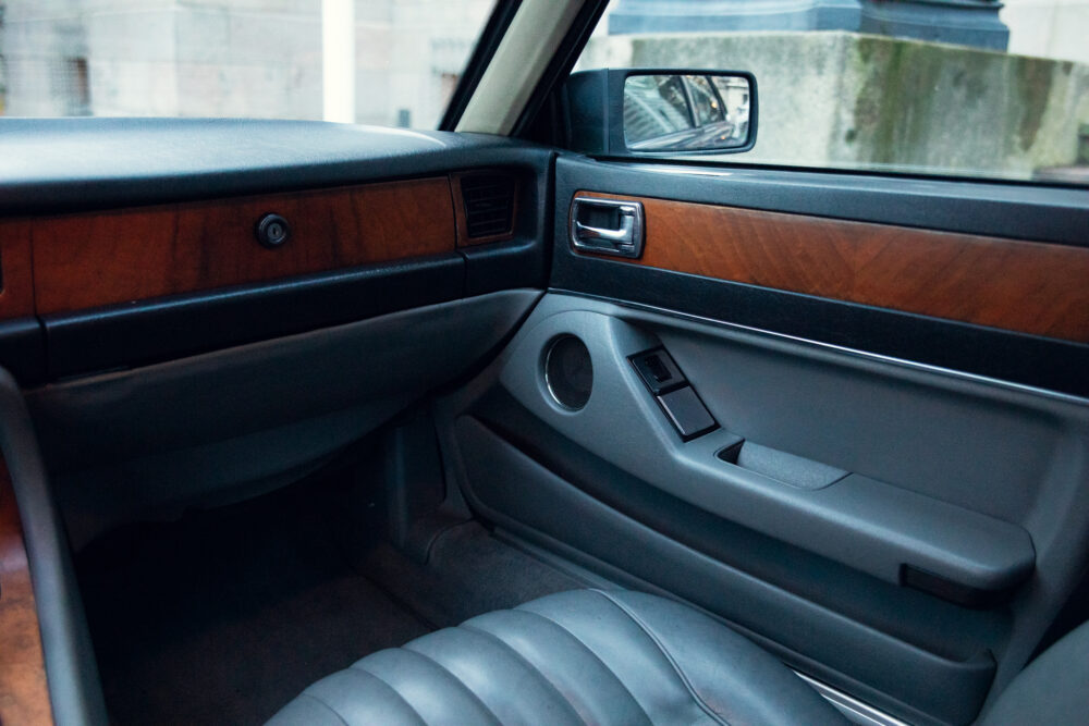 Interior of a vintage car with wooden paneling