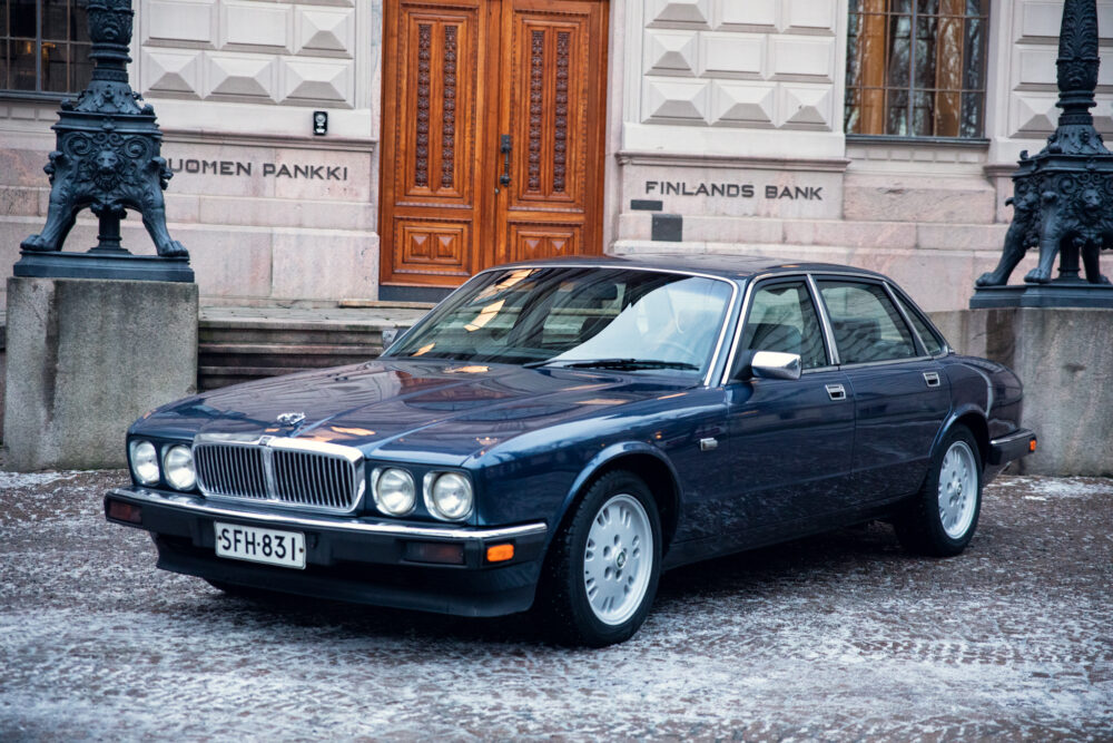 Vintage Jaguar car outside Finland's Bank in winter