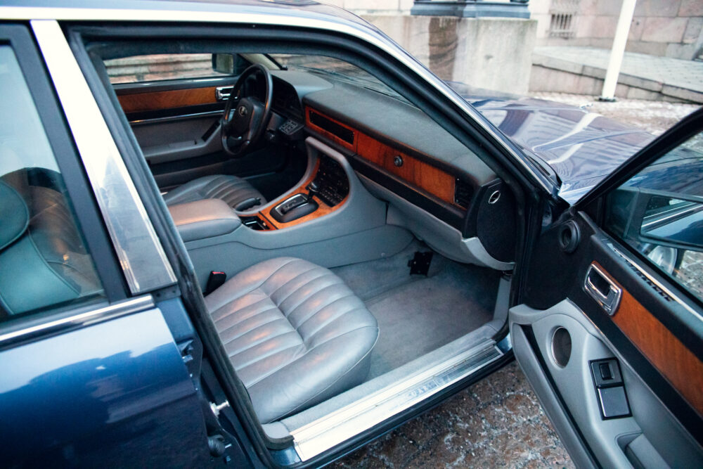 Vintage car interior with leather seats and wood trim