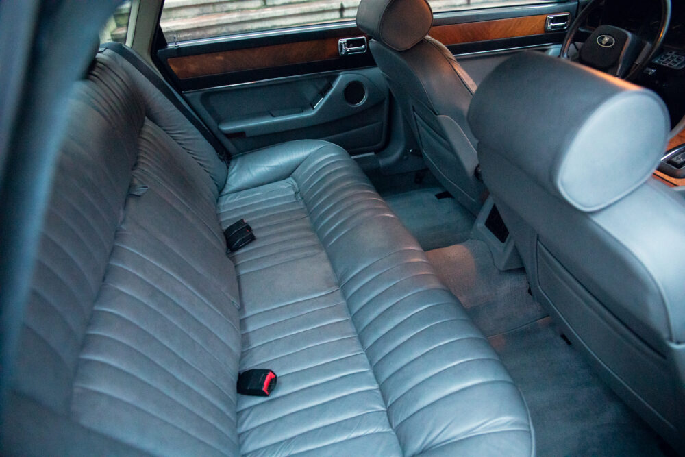 Spacious gray leather car interior, classic design