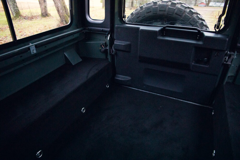 Interior view of a vehicle with spare tire mounted