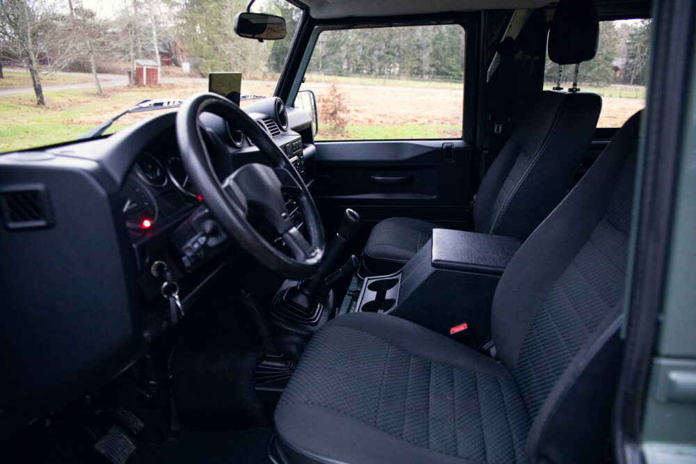 Interior view of modern SUV with dashboard and seats