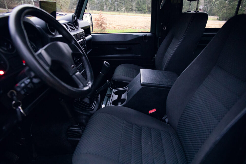 Interior view of a modern car with open doors