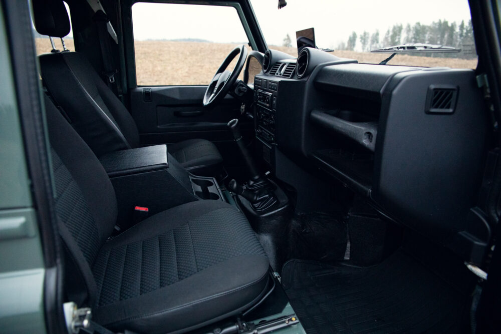 Interior view of modern vehicle's front dashboard and seats